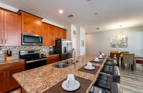 Davenport House | Town Home With Pool in Gated Golf Community Of Champions Gate Resort