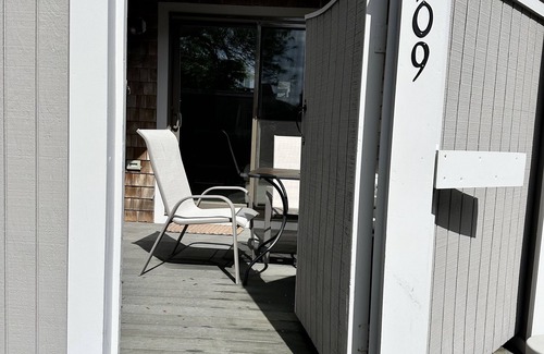 Hyannis House | Townhouse less than one-minute walk to a private beach and heated pool on site