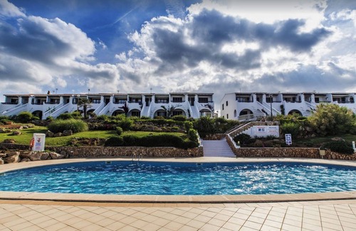 Arenal d'en Castell Apartment | Tranquil apartment with gorgeous sea views. 4 minutes walk to beach & amenities.