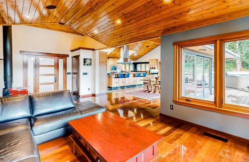 McKinleyville House | Tranquil and luxe river stay with wraparound deck, hot tub, sauna, & mtn views