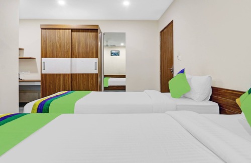 5th Block Hotel | Treebo Purple Orchid Boutique