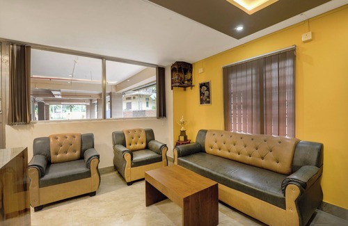 Khanapara Hotel | Treebo Urban Oasis Inn, Sixmile