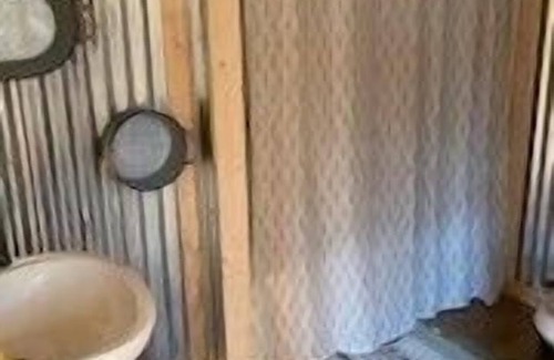 Mentone Cottage | Treehouses located at Little River Canyon overlooking a private lake.