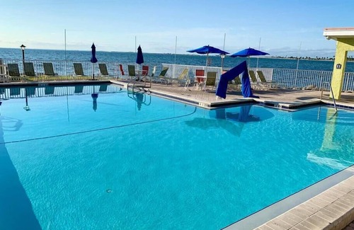 Rocky Point Condo | Tropical Serenity-Water View, Heated Pool Tiki Bar
