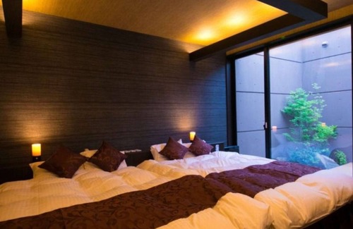 Oita Hotel | Twin bed Tatami Onsen outdoor rock bath/Oita Ōita