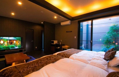 Oita Hotel | Twin bed Tatami Onsen outdoor rock bath/Oita Ōita