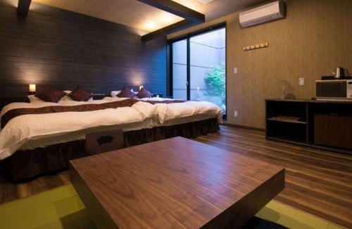 Oita Hotel | Twin bed Tatami Onsen outdoor rock bath/Oita Ōita