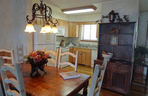 Mount Ida Cottage | Two bedroom, two bath, log-sided, luxury Harbor North cottage overlooking Lake Ouachita. by RedAwning