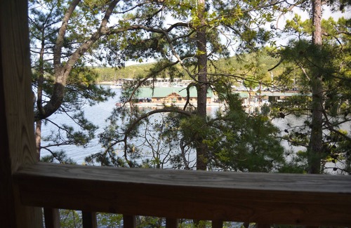 Mount Ida Cottage | Two bedroom, two bath, log-sided, luxury Harbor North cottage overlooking Lake Ouachita. by RedAwning