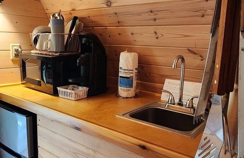 Mill Spring Apartment | Two person Pod on the creek, Deck, private firepit, full bathroom, Kitchenette, Sleeps 2.