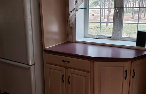 Custer House | Two story authentic log construction home, built in 1936 with two fireplaces.