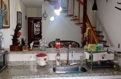 Morro do Algodao House | Two-story house in a gated community
