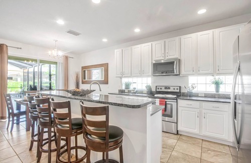 Sunridge Woods Villa | Ultimate 6 Bedroom 5 Bathroom Solterra Resort Home With Pool and Spa 12 Minutes From Disney