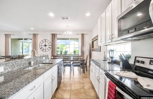 Sunridge Woods Villa | Ultimate 6 Bedroom 5 Bathroom Solterra Resort Home With Pool and Spa 12 Minutes From Disney