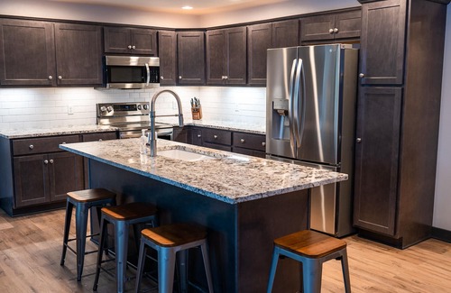 Manitowoc House | 𝗨𝗻𝗶𝗾𝘂𝗲 𝗦𝘁𝗮𝘆 at the Carriage Haus