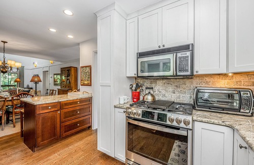 West Beach Cottage | Unique upscale 3 bdrm, 3 bath Oceanwoods cottage on lagoon; 150 yds from beach.