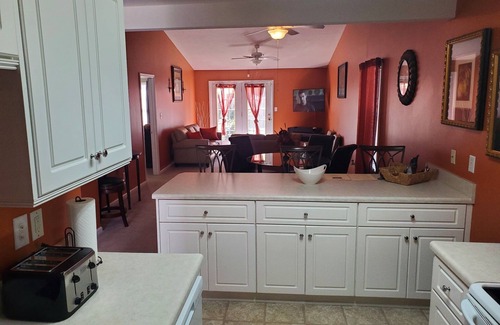 St. Andrews House | Unplug and Enjoy a cozy home with a backyard patio, grill, and free Wi-Fi.