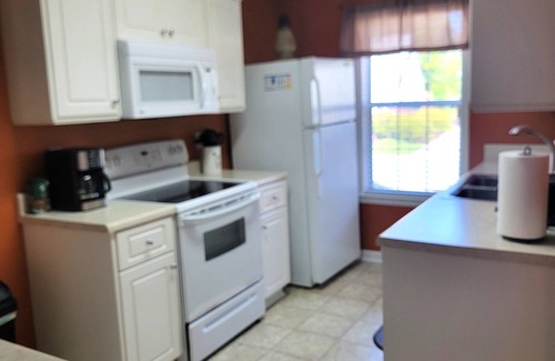 St. Andrews House | Unplug and Enjoy a cozy home with a backyard patio, grill, and free Wi-Fi.