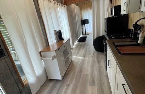 Odessa Cabin | Unplug and unwind in this charming loft cabin nestled on the water’s edge.