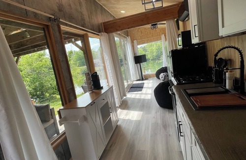 Odessa Cabin | Unplug and unwind in this charming loft cabin nestled on the water’s edge.