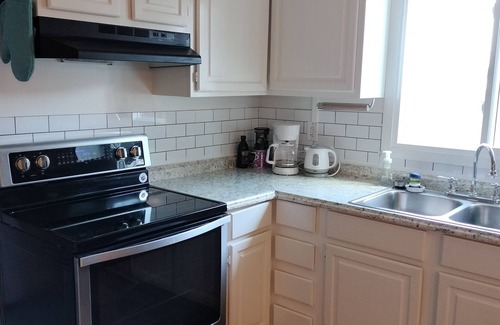 Lakeview House | Updated home on 2/3 acre w/HOT TUB and BOAT DOCK! Walk to 3 bars/eateries