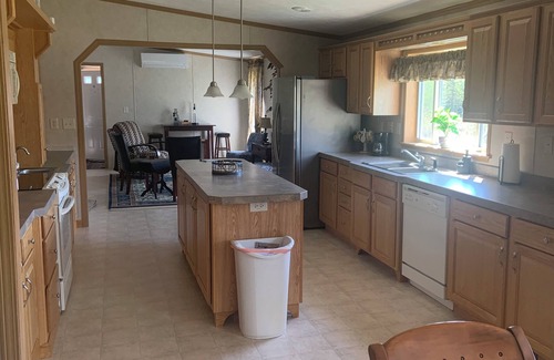 Patten House | UPNORTH GETAWAY. Spacious 4 bedroom, 3 bathroom. On the ATV/Snowmobile Trails