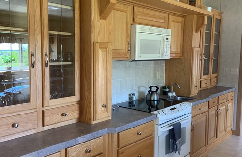 Patten House | UPNORTH GETAWAY. Spacious 4 bedroom, 3 bathroom. On the ATV/Snowmobile Trails