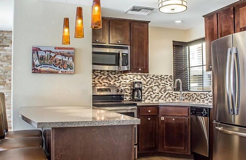 Cibola Vista Resort | UpScale Resort with Outdoor Heated Pool with a waterslide and a poolside bar, tennis court and gym