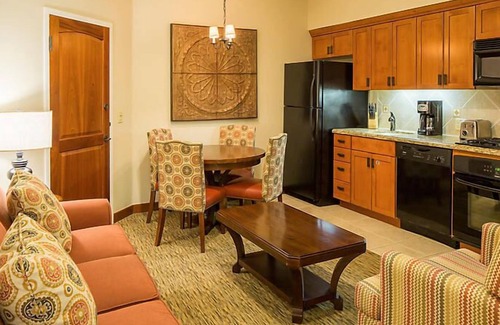 Cibola Vista Resort | UpScale Resort with Outdoor Heated Pool with a waterslide and a poolside bar, tennis court and gym