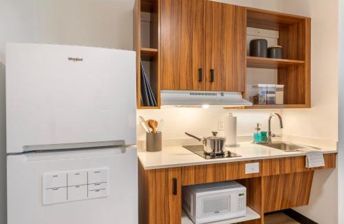 Greater Palm River Point CDC Hotel | Uptown Suites Extended Stay Tampa FL - Riverview