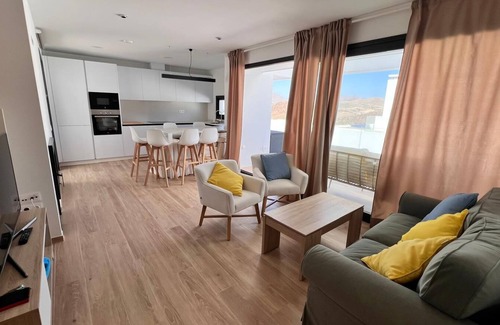 San Jose Ski Chalet | Urbanization with swimming pool and gym. BBQ and private solarium. Panoramic views.