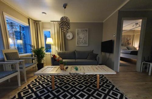 Inari House | Väre Holiday Home - lakeside relaxation point