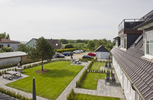 Gross Zicker Apartment | Vacation apartment with sea view, balcony and garden - Haus Inselblick FeWo MEERluft