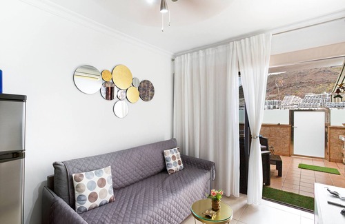 Puerto Rico Apartment | Vacation Apartment 'Aloe Puerto Rico Beach' with Sea View, Wi-Fi and Air Conditioning