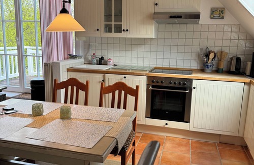 Grebin Apartment | Vacation apartment "Zum See": Direct view of the lake and the dressage arena