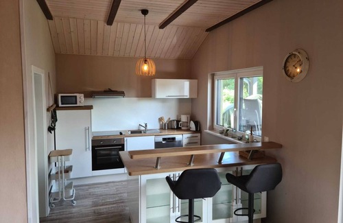 Sehestedt House | Vacation home Haus Seehund - Directly behind the dike on the North Sea