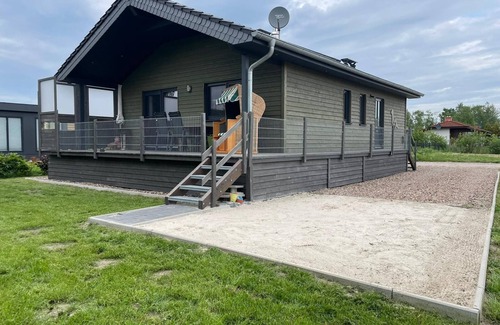 Sehestedt House | Vacation home Haus Seehund - Directly behind the dike on the North Sea