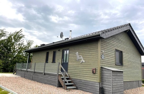 Sehestedt House | Vacation home Haus Seehund - Directly behind the dike on the North Sea