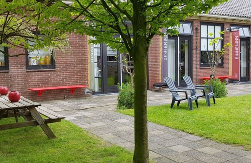 Metslawier Apartment | Vacation in a little school? Former classrooms with communal living kitchen!