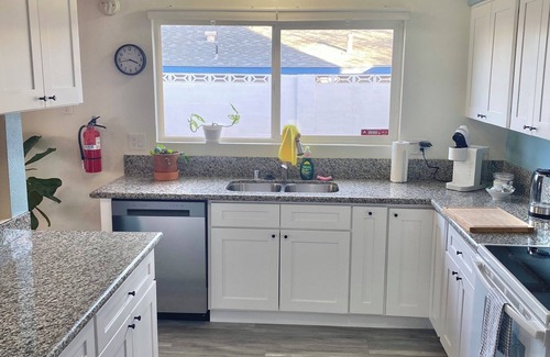 Paradise House | Vegas Oasis 4BR Pool + Patio Near Strip & Airport