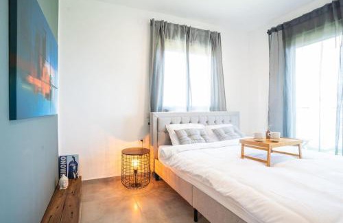 Nahariya Apartment | Vibrant Seaside Stay with Balcony by Sea N' Rent