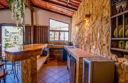 Roble House | View paradise with an expansive yard, wood-burning fireplace, and W/D