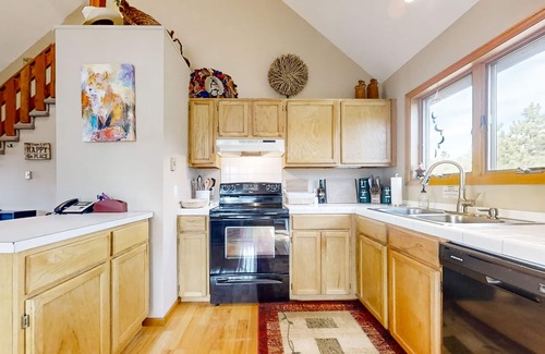 Glacier View Meadows House | View-worthy wilderness retreat with cozy fireplace