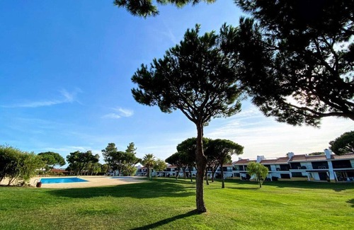 Quarteira Apartment | Vila Sol: Nice apartment with large south-facing terrace and view of own park