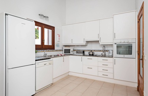 Sant Lluis Villa | Villa 'Arcola' with Sea View, Wi-Fi and Air Conditioning