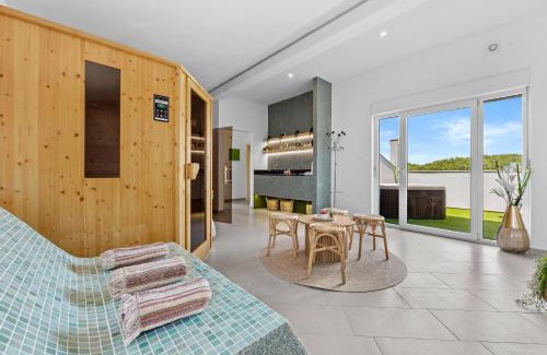 Loborika Villa | Villa Spa Otium for 8 people with 32 m2 heated pool, outdoor cinema, kids playground & spa area