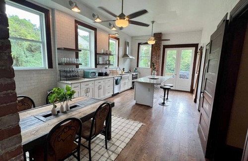 Five Points South House | Vulcan's Knee: 6bdrm Mansion ~ Speakeasy ~ Library