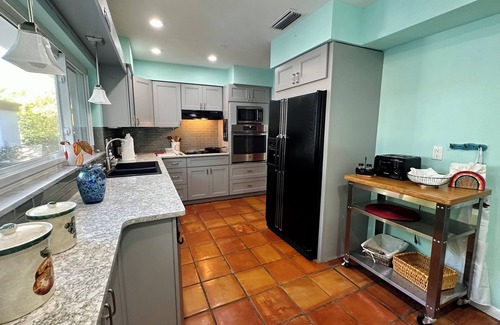 Coquina Sands House | Walk To Beach From Cottage-Style Home In The Heart of Naples