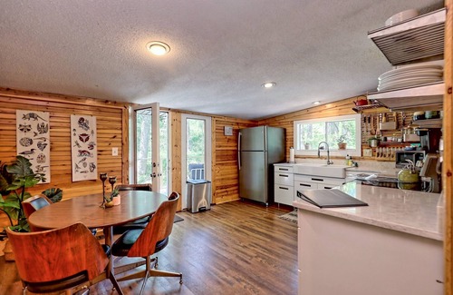 Clayton House | Walk-to-Downtown Retreat | Creekside + Hot Tub