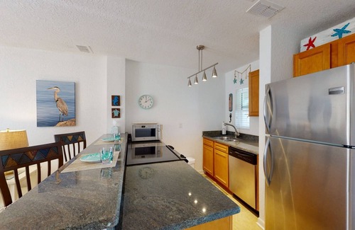 Pass-a-Grille Historic District Condo | Walk to The Best Restaurants, Beaches, and Activities. Heated Pool. Fabulous Location.